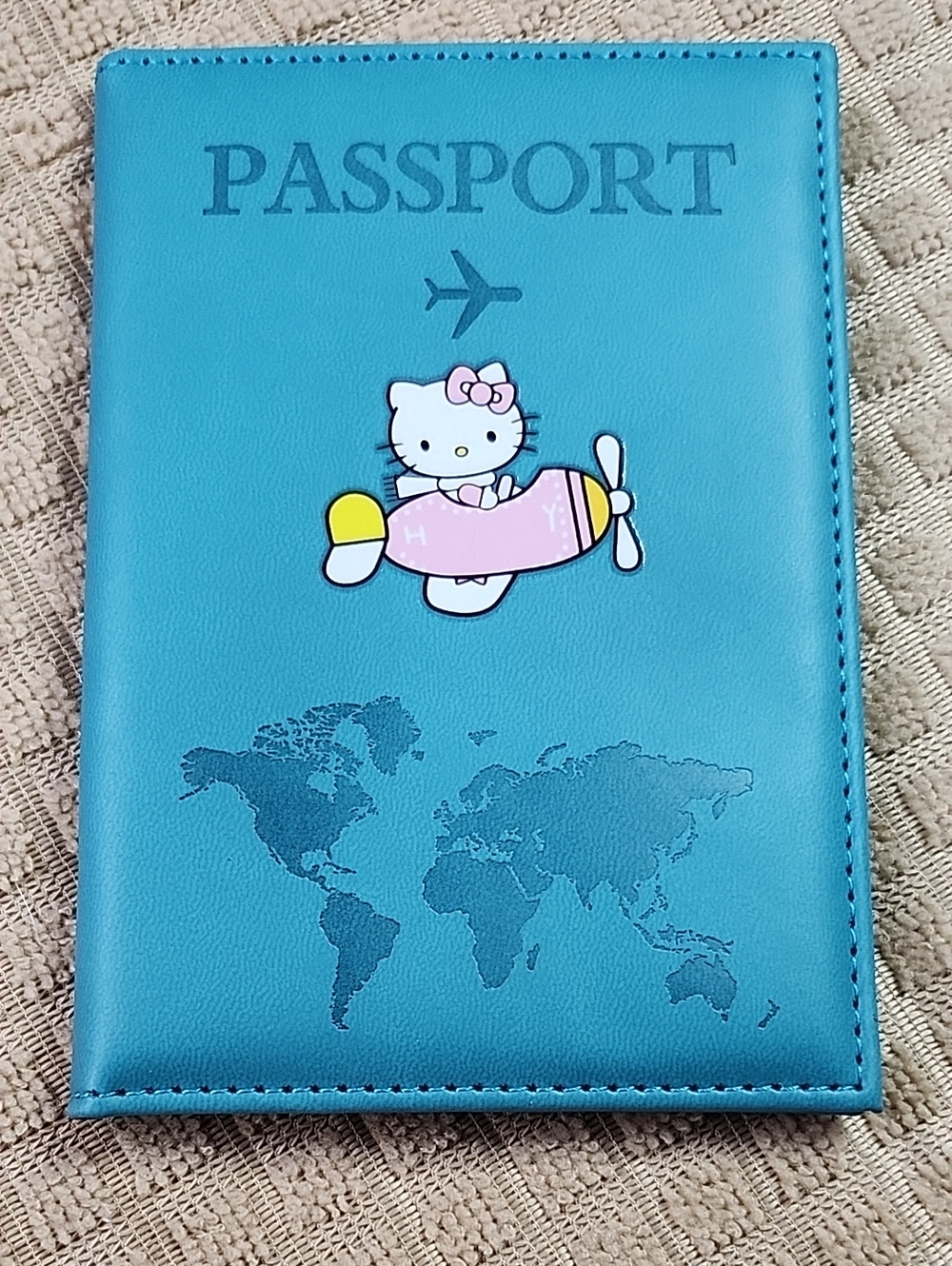 Hello kitty passport cover in blue